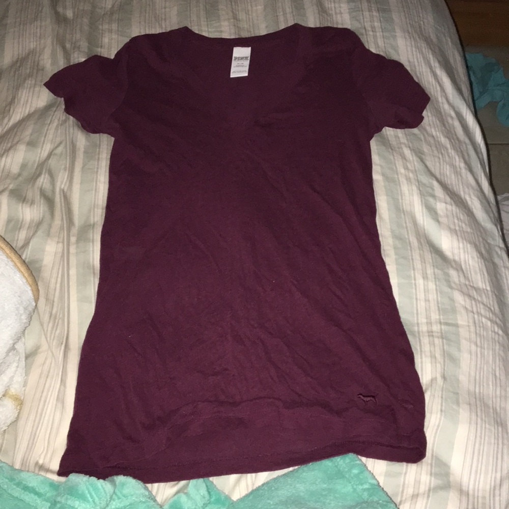 Maroon size medium shirt from pink.